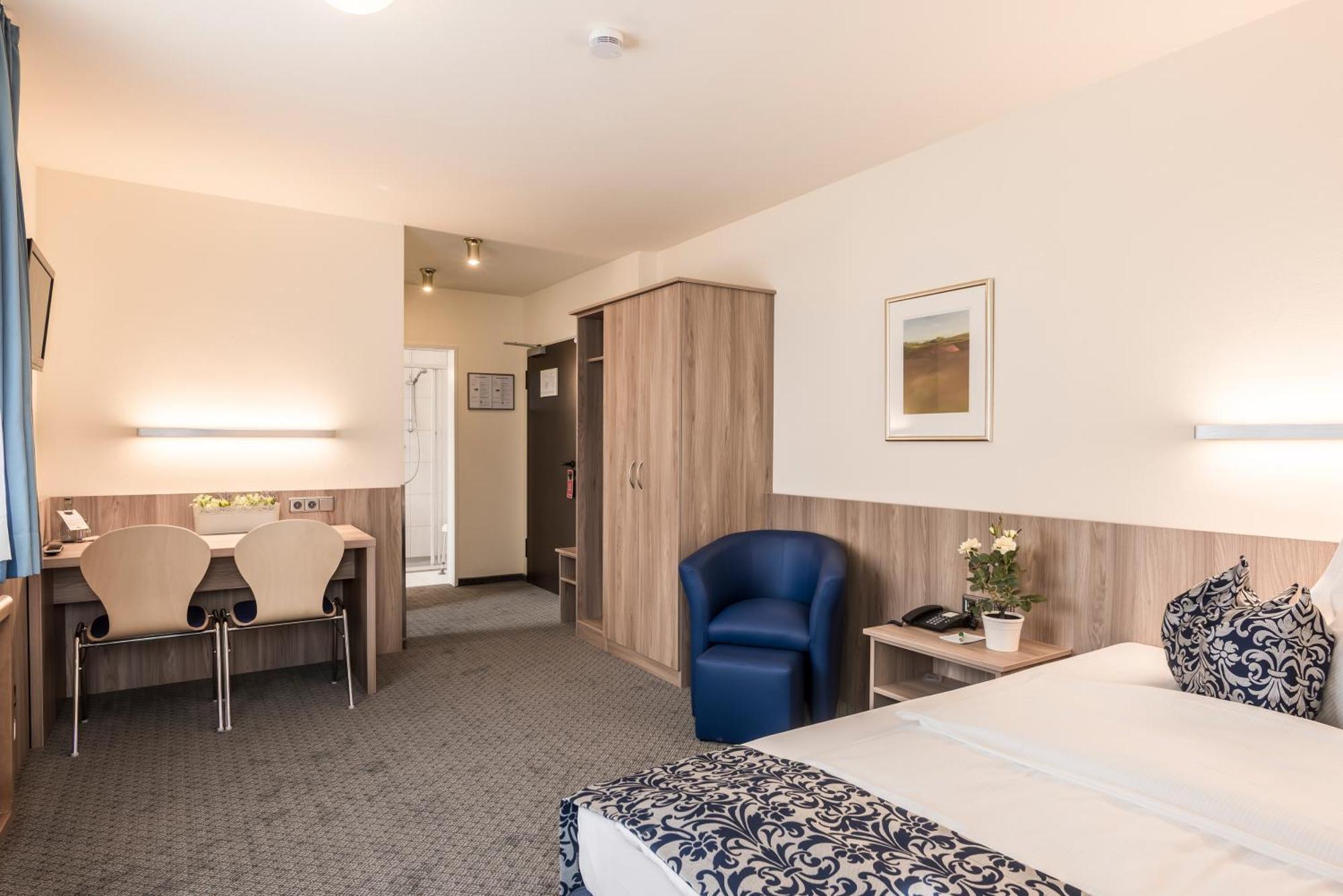 מינכן Hotel Am Moosfeld חדר תמונה Hotelzimmer